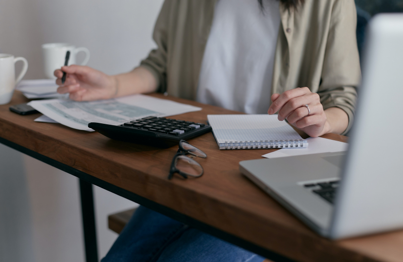 Doing accounts at a desk