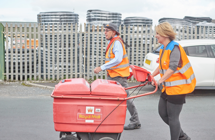 Katherine Fletcher MP helping postman on Leyland shift 