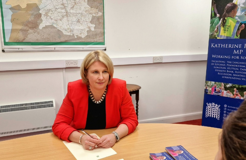 Katherine Fletcher sat at a table, opposite a constituent.