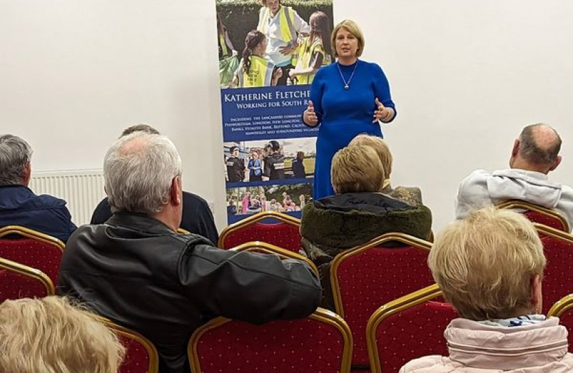 Katherine talking to a group of people