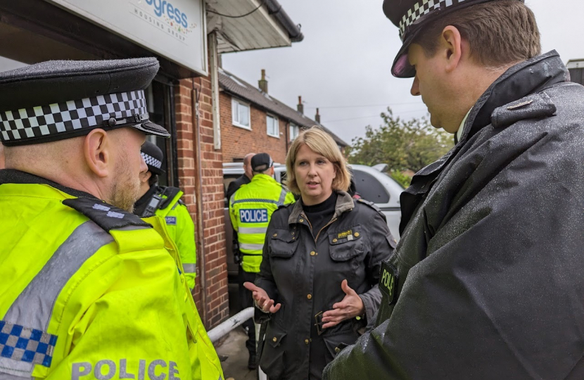 Katherine talking to police officers