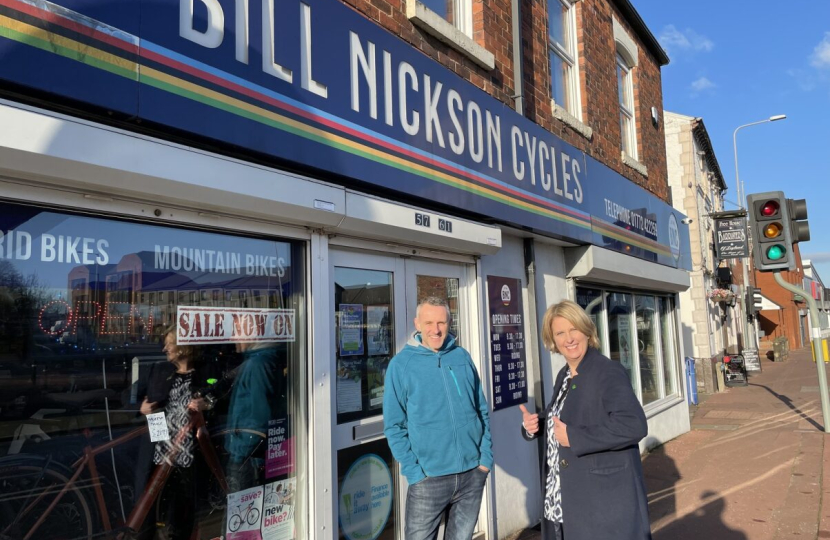 Katherine and owner outside Bill Nickson Cycles