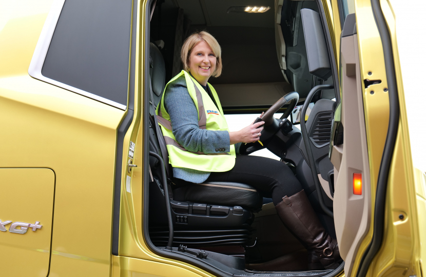 Katherine driving a truck