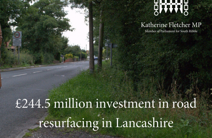 Road with words £244.5 million investment in road resurfacing in Lancashire across it.