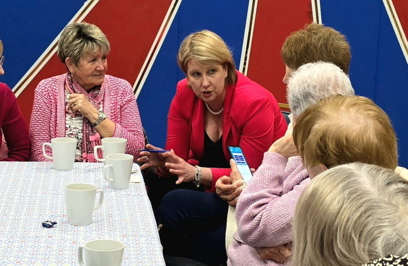 Katherine talking to a group of people